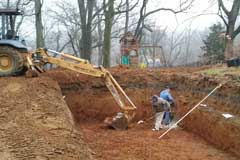 Excavate and level the small gravel base photo 3